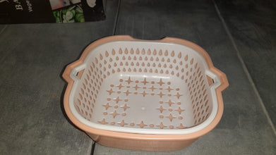 2-in-1 basket strainer designed for rinsing and draining